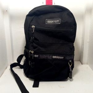 Embody black and white mini back pack